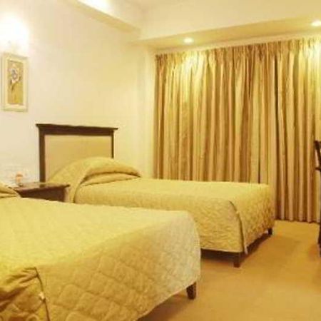 Hotel Mandakini Ambience Pune Habitación foto